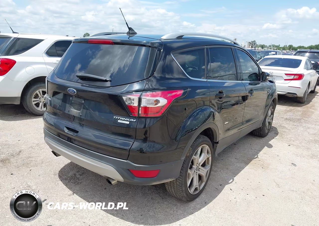 2018 Ford Escape Titanium VIN:1FMCU0J97JUD49869 - 4