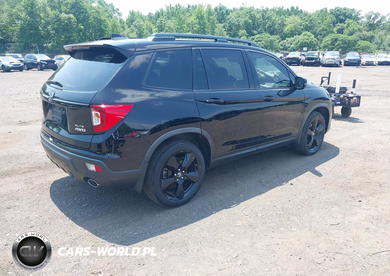 2019 Honda Passport Elite VIN:5FNYF8H01KB002087 - 4