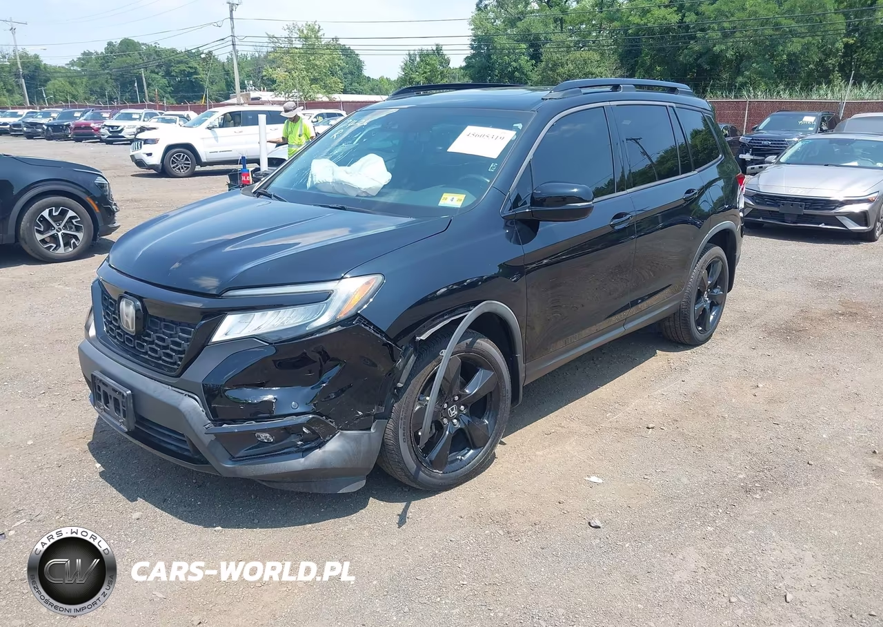 2019 Honda Passport Elite VIN:5FNYF8H01KB002087 - 6
