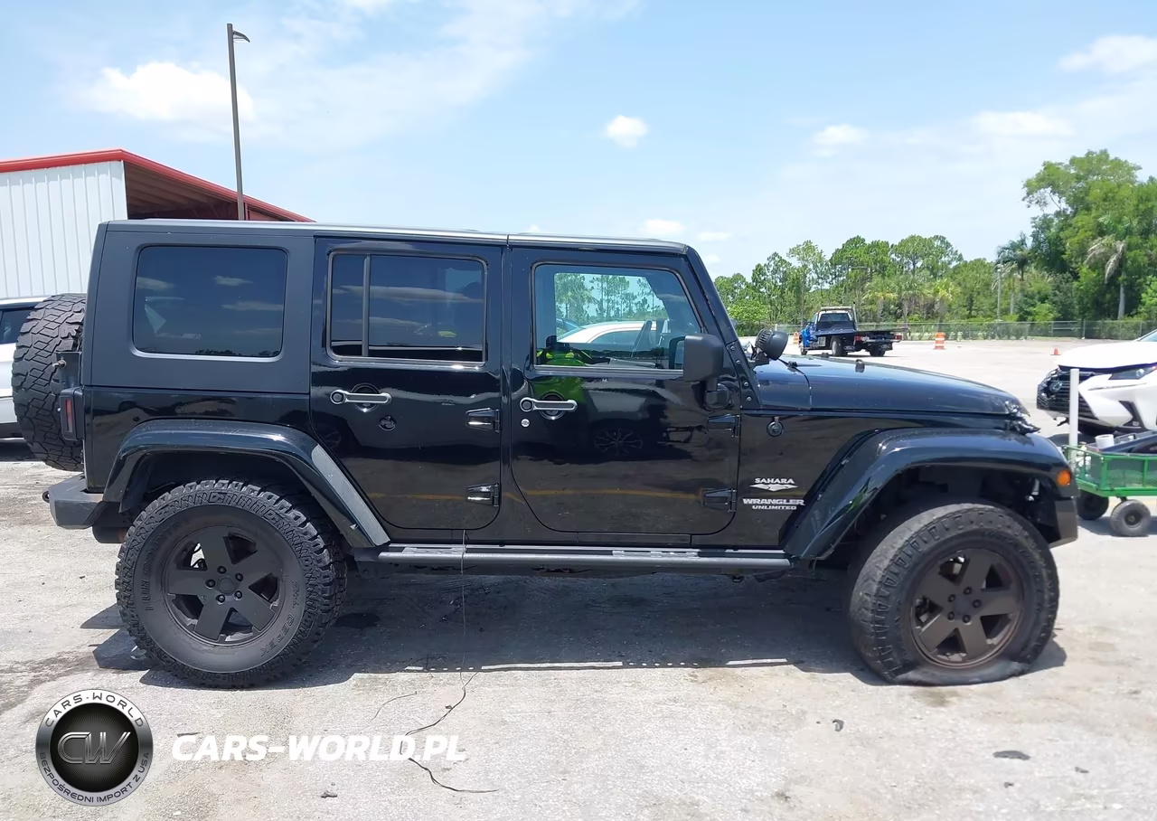 2010 Jeep Wrangler Unlimited Sahara VIN:1J4HA5H15AL181732 - 13