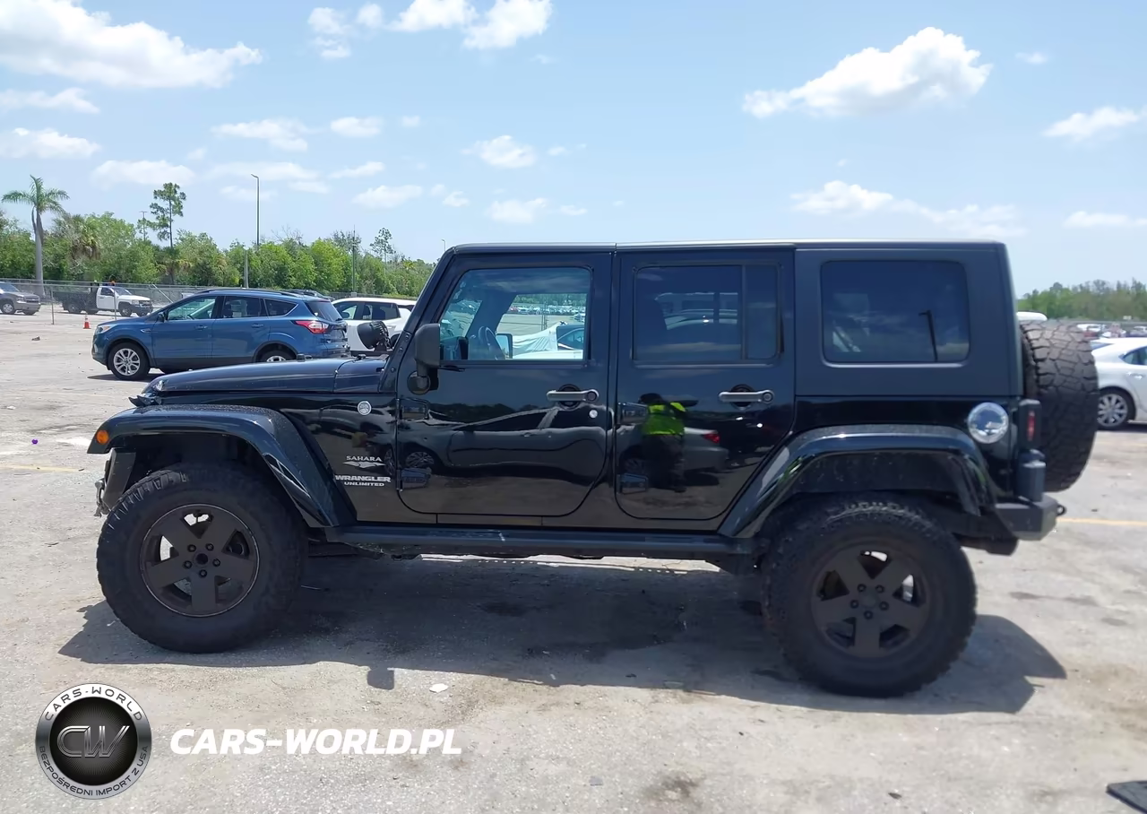 2010 Jeep Wrangler Unlimited Sahara VIN:1J4HA5H15AL181732 - 14