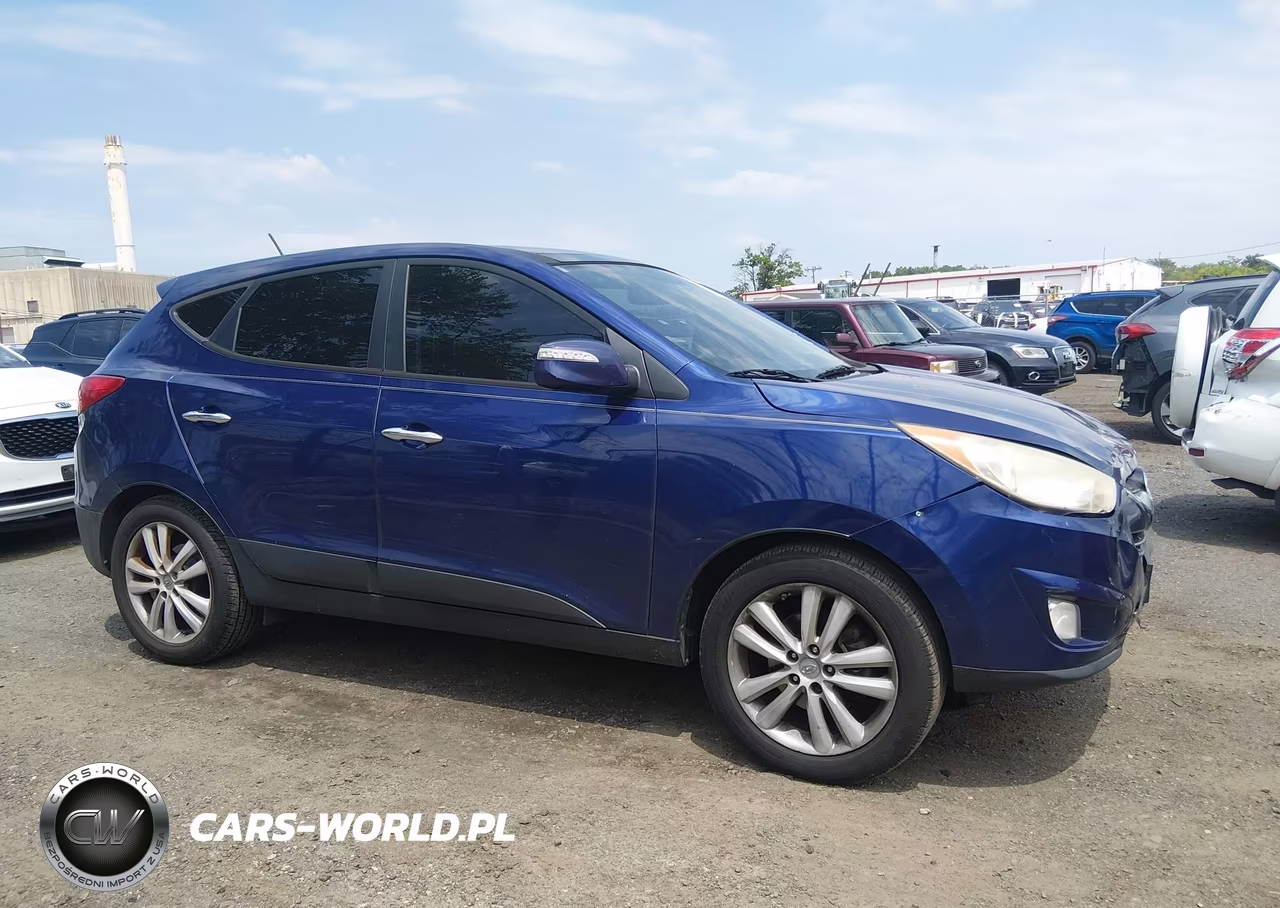 2011 Hyundai Tucson Limited VIN:KM8JUCAC3BU142532 - 13