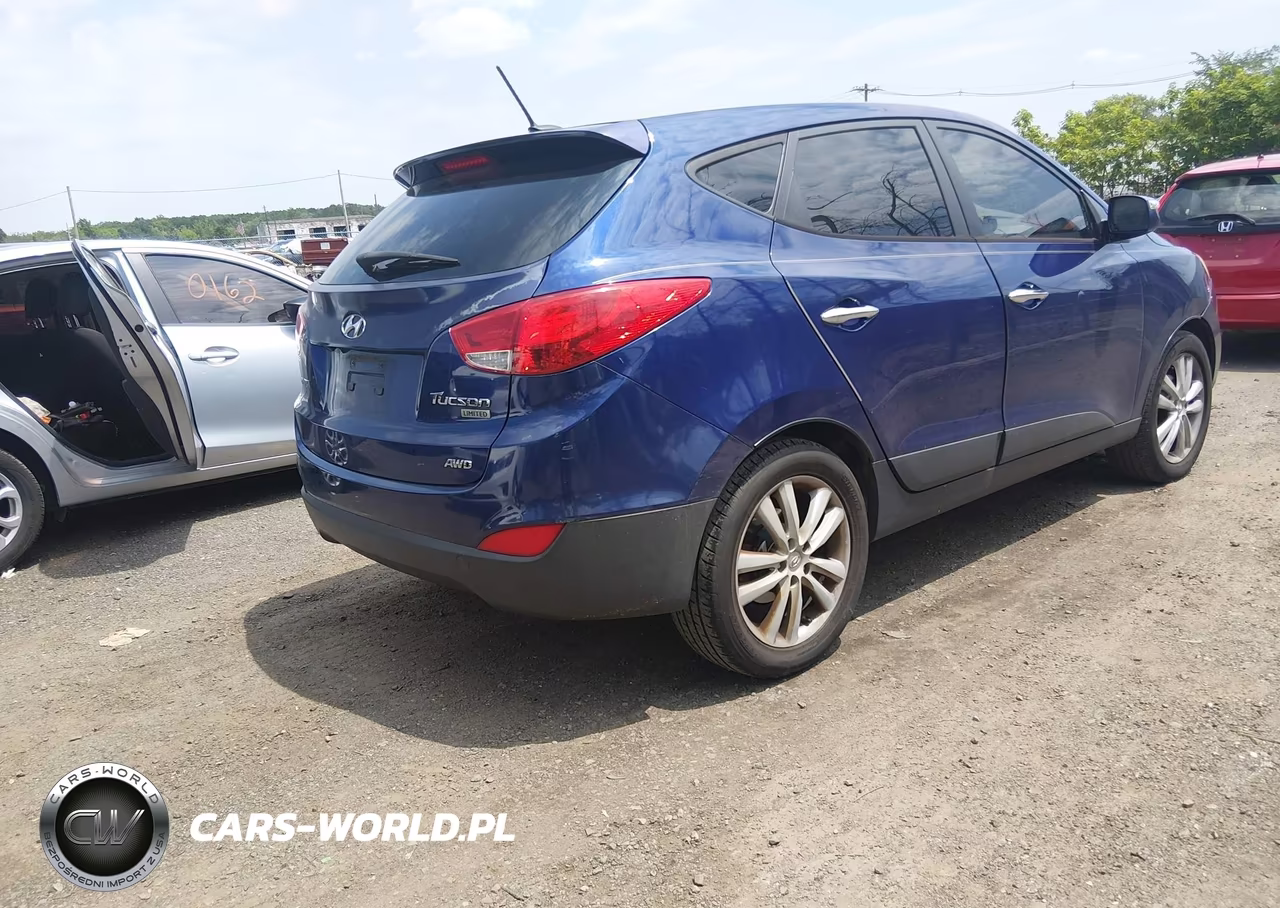 2011 Hyundai Tucson Limited VIN:KM8JUCAC3BU142532 - 4