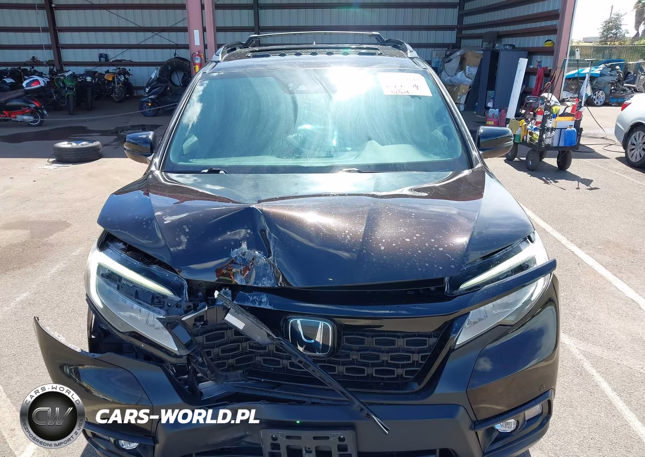 2019 Honda Passport Touring VIN:5FNYF7H92KB000809 - 13