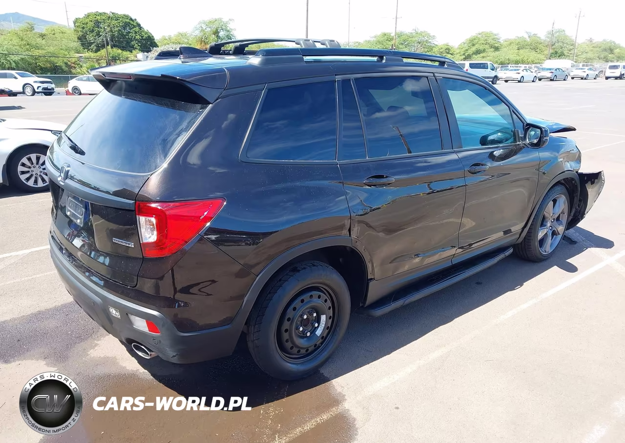 2019 Honda Passport Touring VIN:5FNYF7H92KB000809 - 4