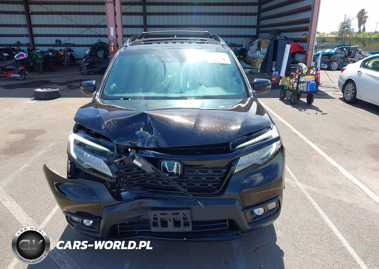 2019 Honda Passport Touring VIN:5FNYF7H92KB000809 - 6