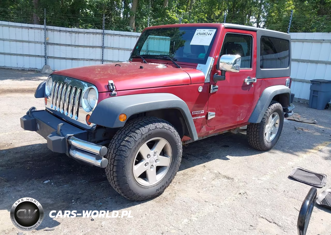 2012 Jeep Wrangler Sport VIN:1C4AJWAGXCL253698 - 2