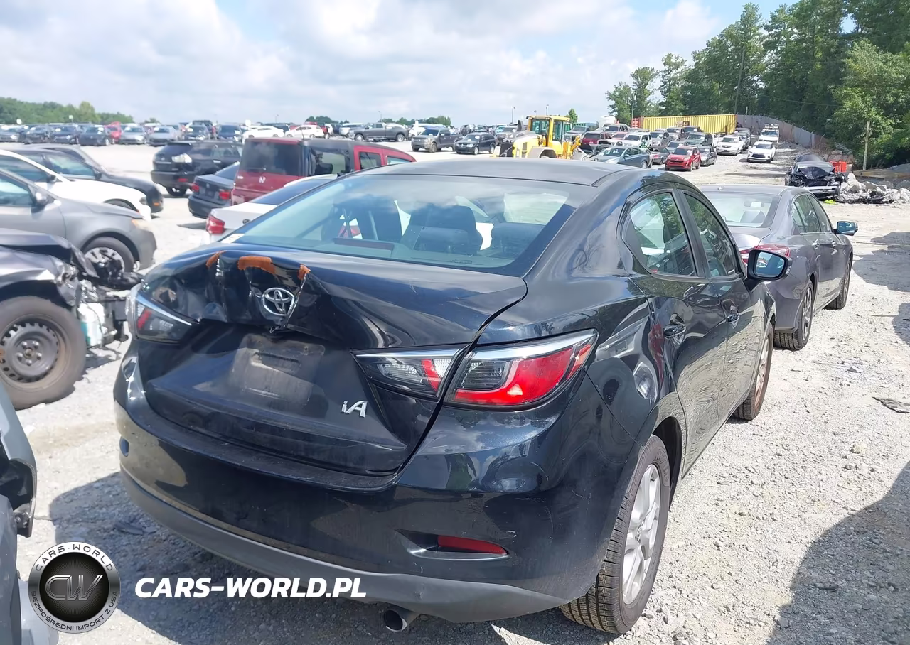 2017 Toyota Yaris Ia VIN:3MYDLBYV3HY165497 - 4