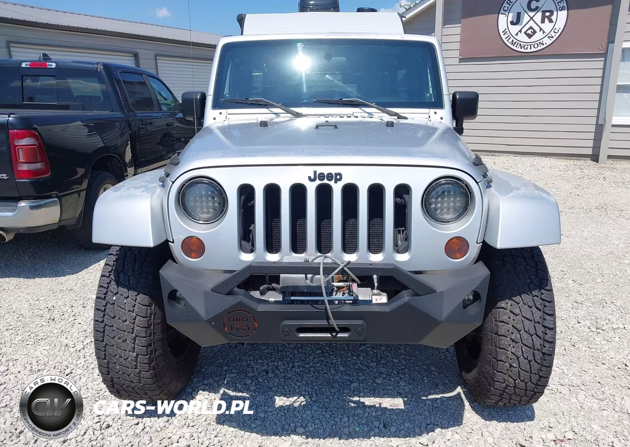 2007 Jeep Wrangler Unlimited Sahara VIN:1J4GA59197L170025 - 12