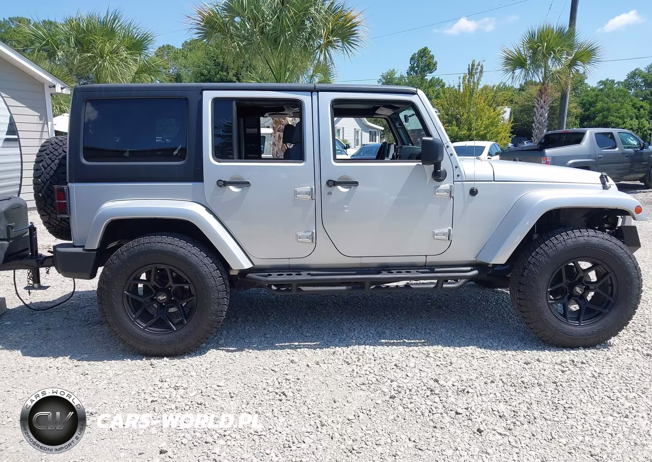 2007 Jeep Wrangler Unlimited Sahara VIN:1J4GA59197L170025 - 13