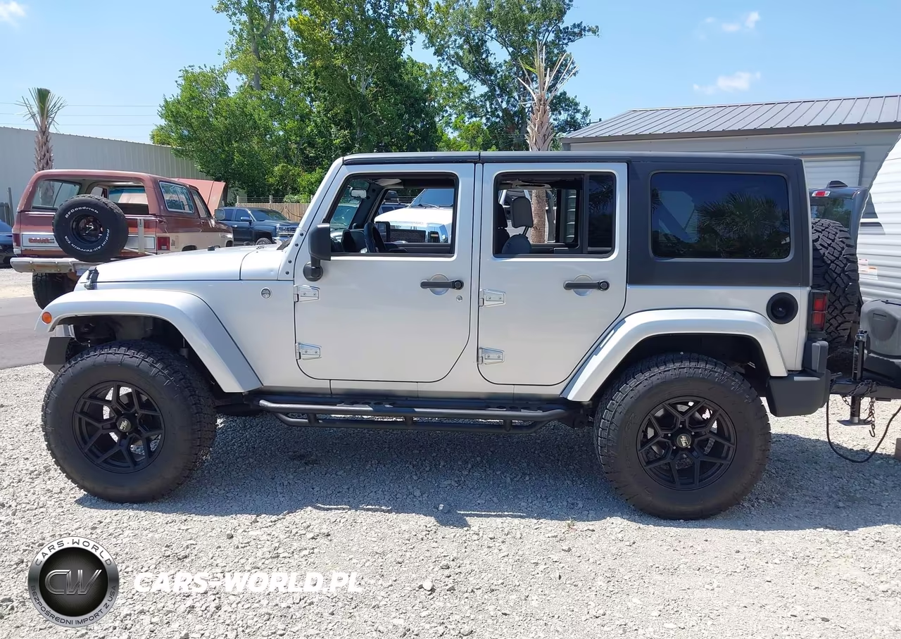 2007 Jeep Wrangler Unlimited Sahara VIN:1J4GA59197L170025 - 14