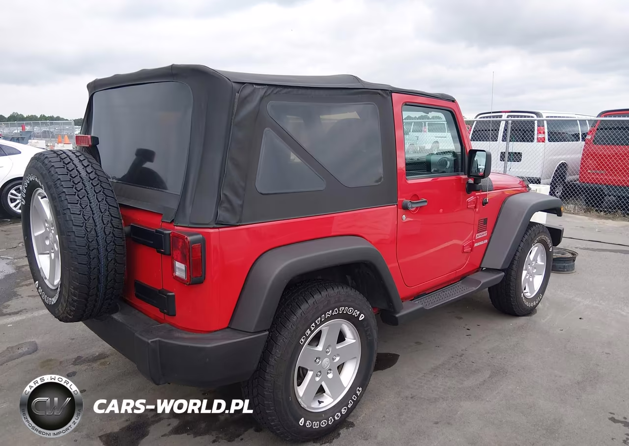 2011 Jeep Wrangler Sport VIN:1J4AA2D11BL628337 - 4