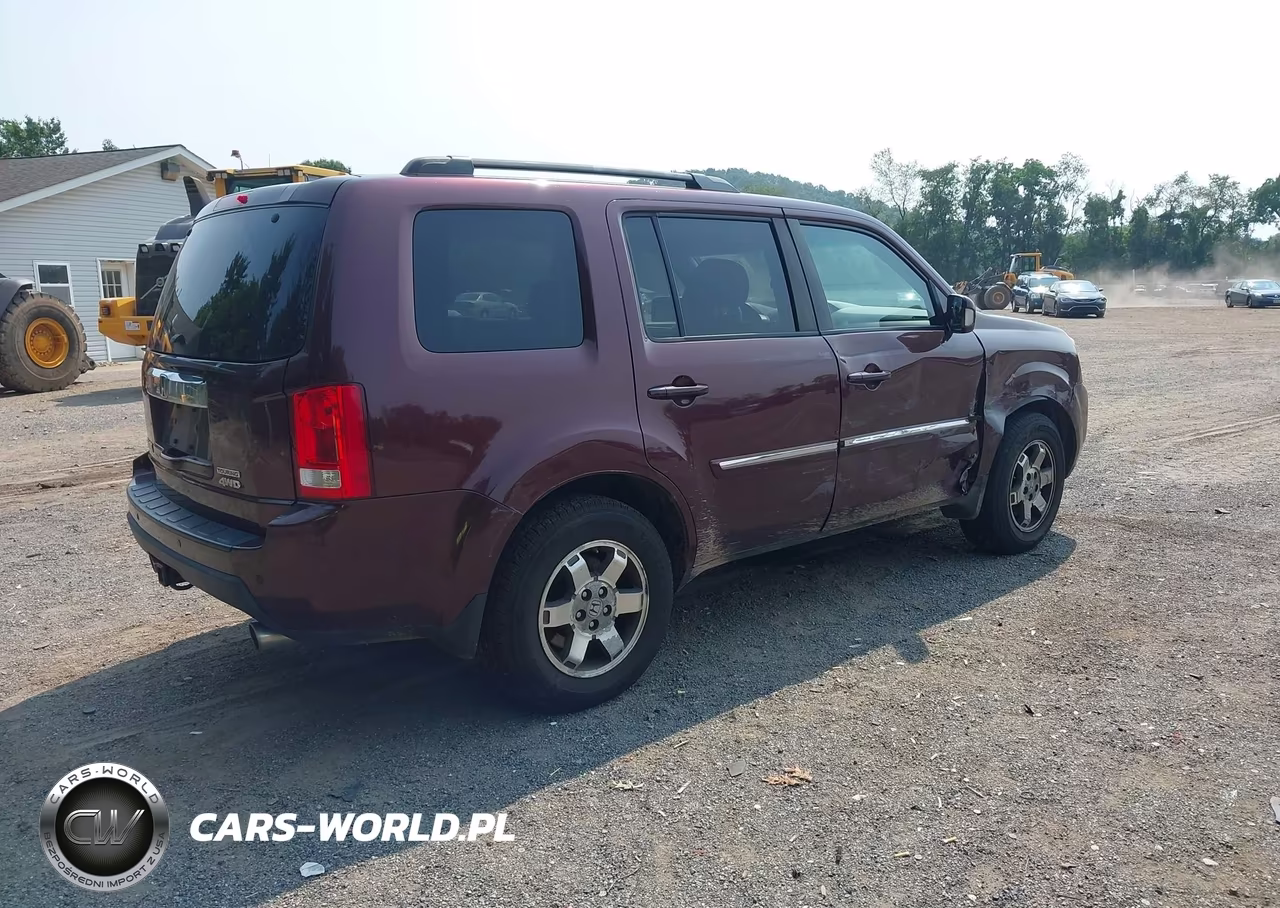 2011 Honda Pilot Touring VIN:5FNYF4H96BB042740 - 4