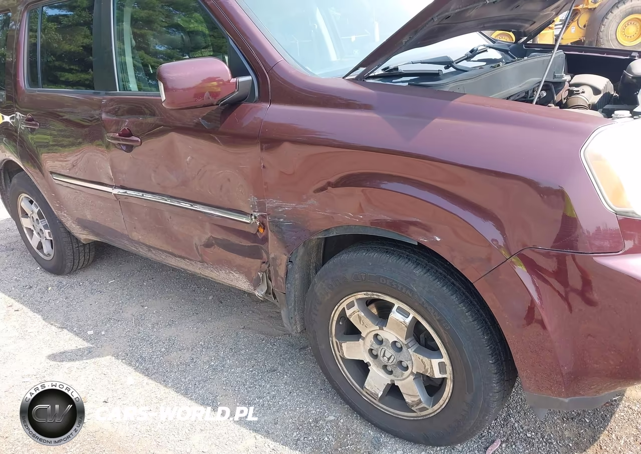 2011 Honda Pilot Touring VIN:5FNYF4H96BB042740 - 6
