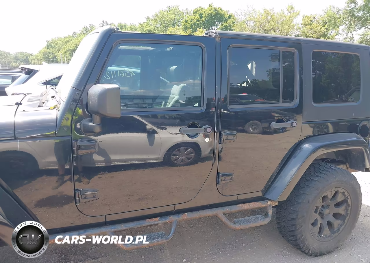 2009 Jeep Wrangler Unlimited Sahara VIN:1J4GA59159L759656 - 14