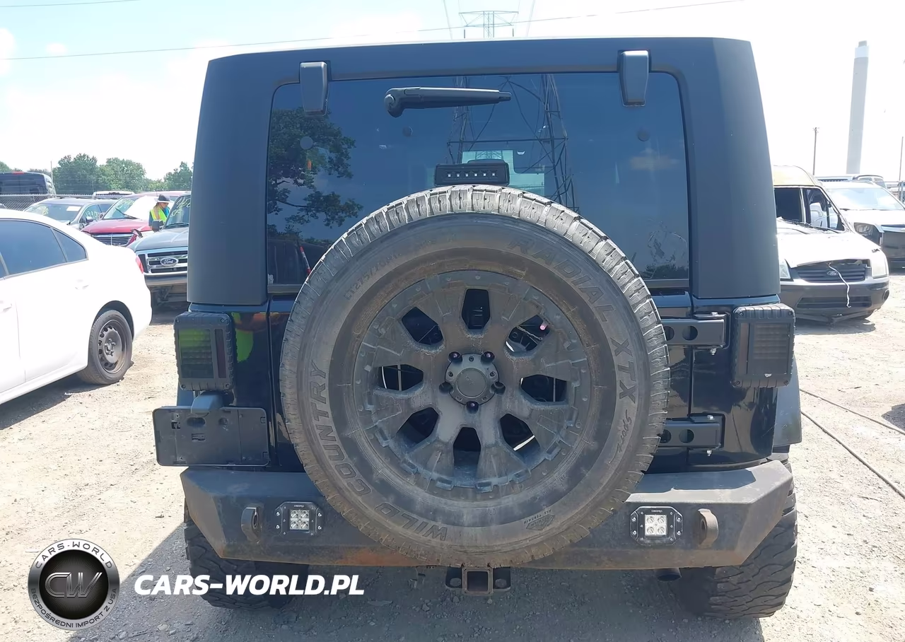 2009 Jeep Wrangler Unlimited Sahara VIN:1J4GA59159L759656 - 16
