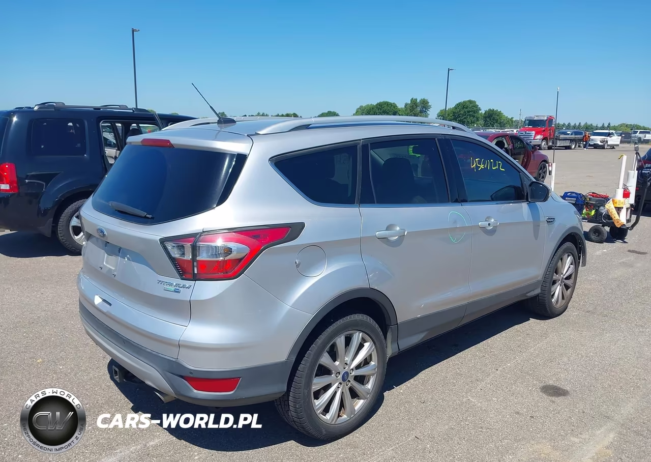 2017 Ford Escape Titanium VIN:1FMCU9J98HUA64970 - 4