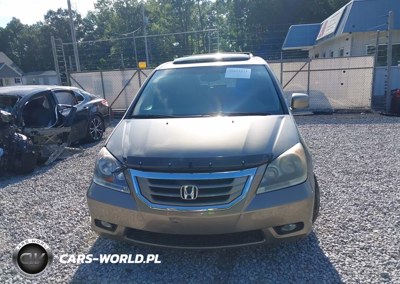 2010 Honda Odyssey Touring VIN:5FNRL3H91AB065123 - 12
