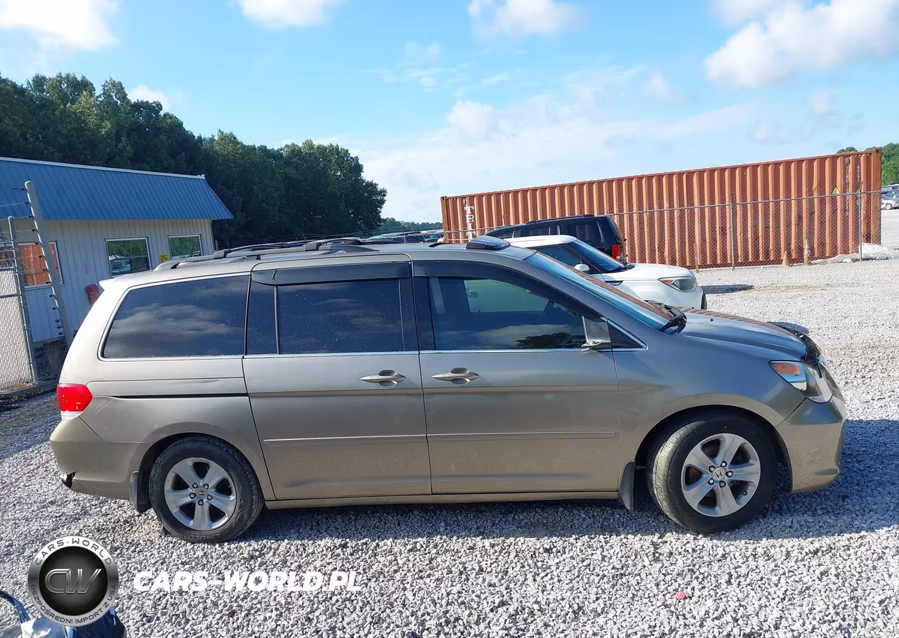 2010 Honda Odyssey Touring VIN:5FNRL3H91AB065123 - 13
