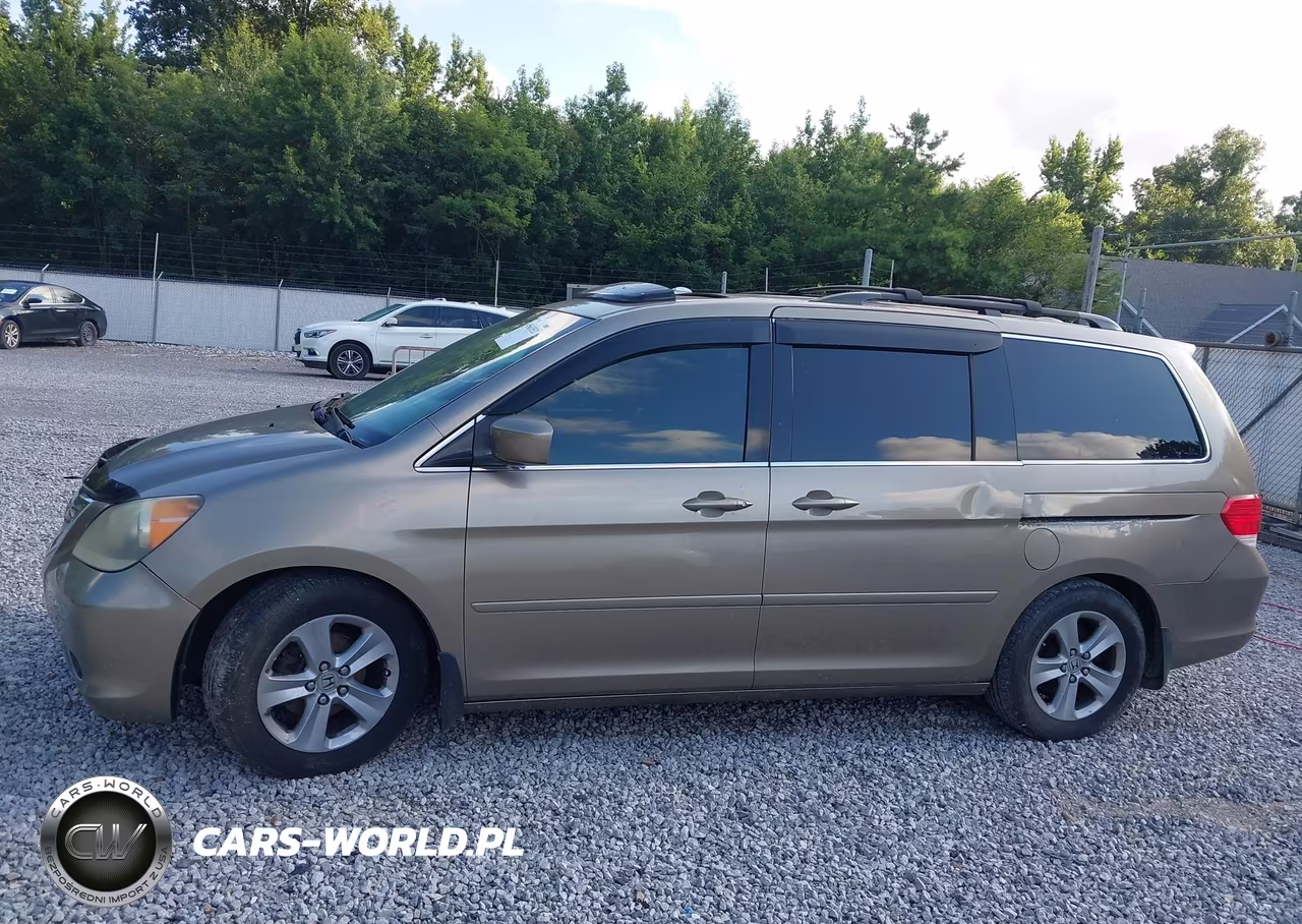 2010 Honda Odyssey Touring VIN:5FNRL3H91AB065123 - 14