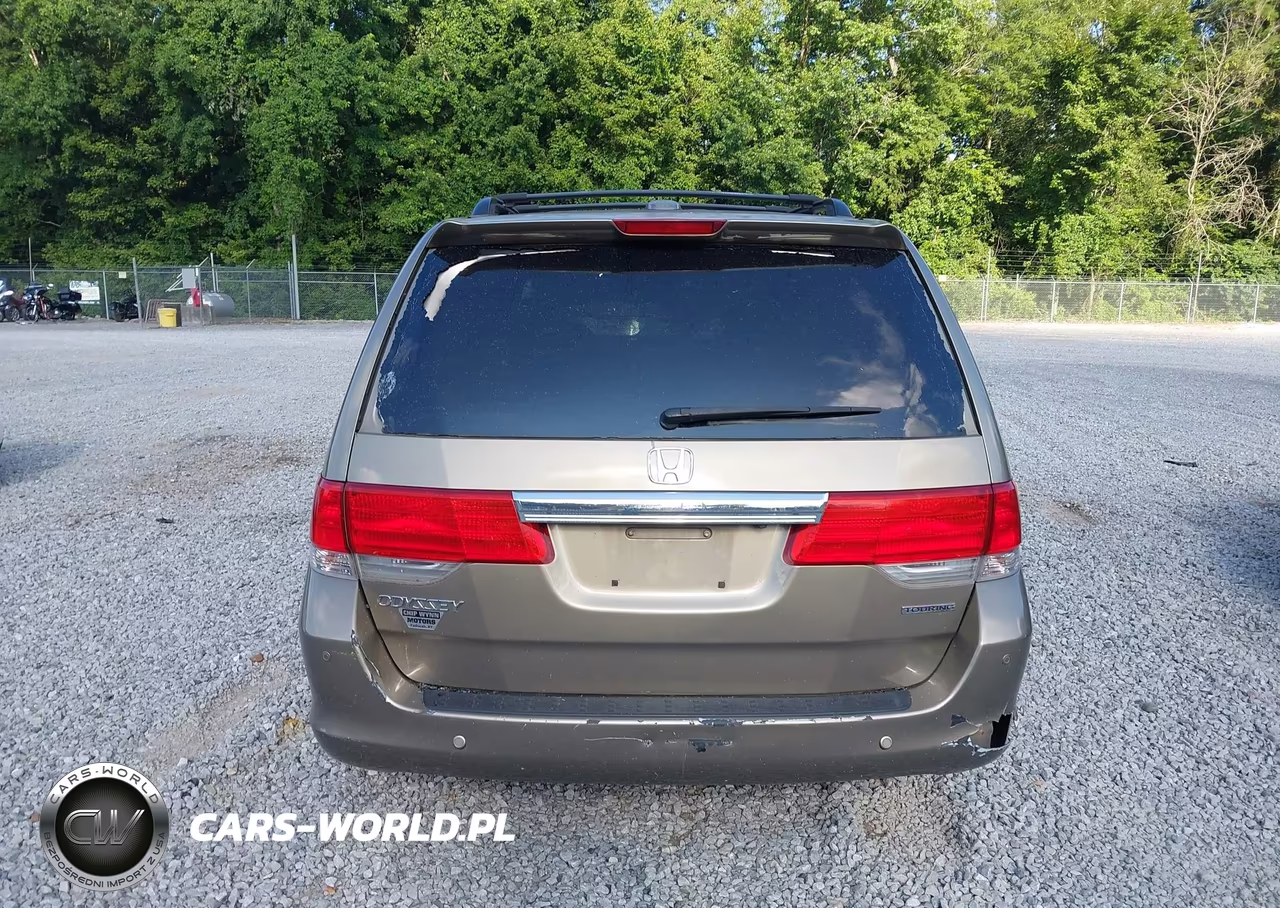 2010 Honda Odyssey Touring VIN:5FNRL3H91AB065123 - 16