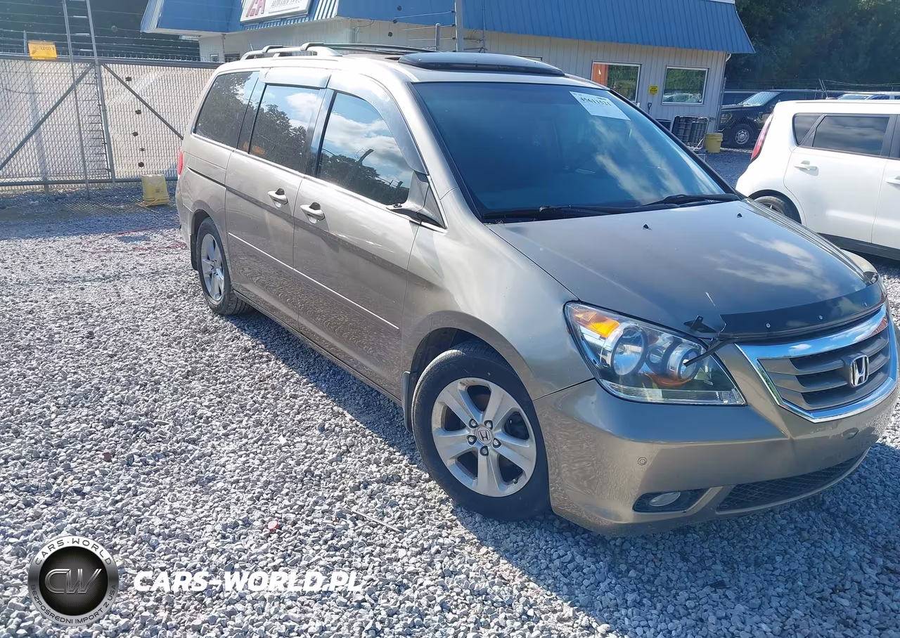 2010 Honda Odyssey Touring VIN:5FNRL3H91AB065123 - 17