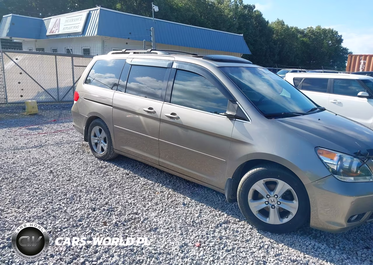 2010 Honda Odyssey Touring VIN:5FNRL3H91AB065123 - 18