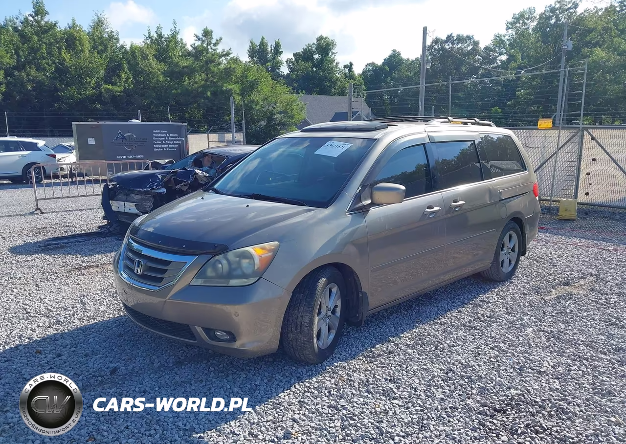 2010 Honda Odyssey Touring VIN:5FNRL3H91AB065123 - 2