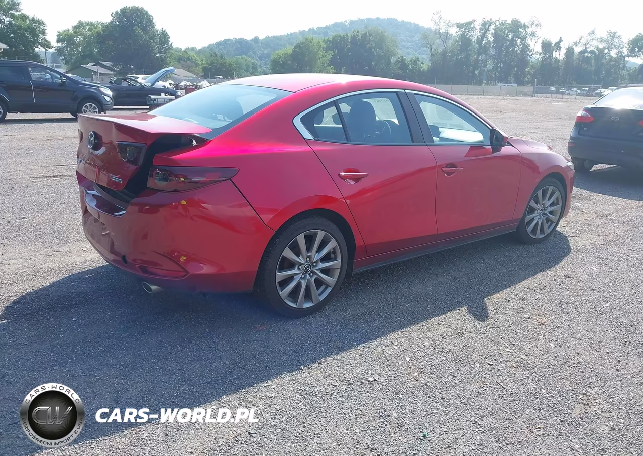 2019 Mazda Mazda3 Select Package VIN:JM1BPACL1K1111847 - 4