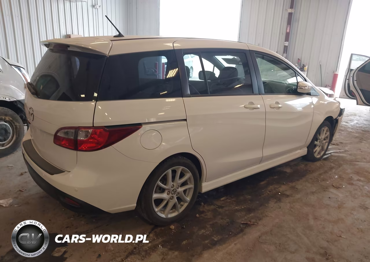 2015 Mazda Mazda5 Touring VIN:JM1CW2CL9F0180004 - 4