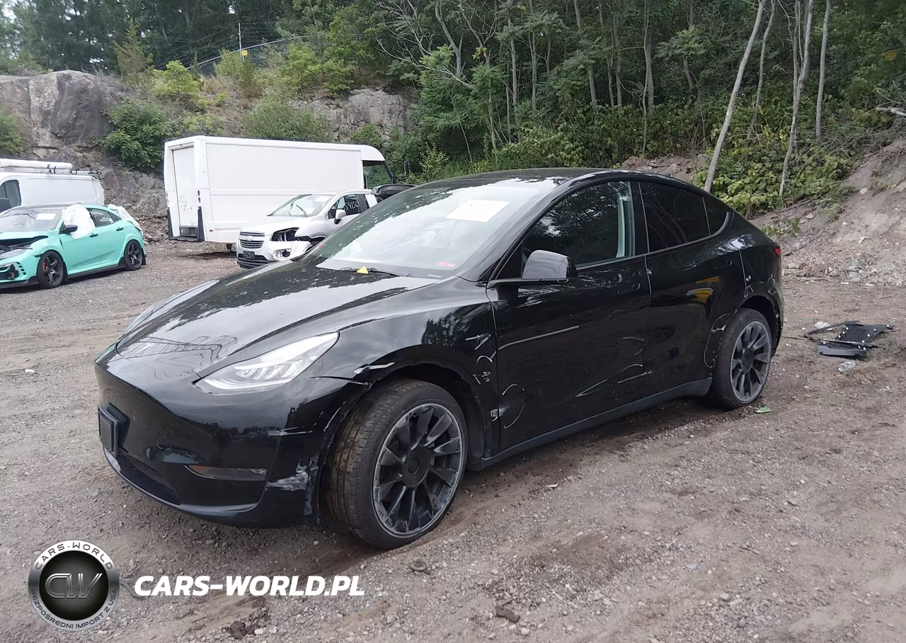 2023 Tesla Model Y Awd-Long Range Dual Motor All-Wheel Drive VIN:7SAYGDEE4PA050972 - 2