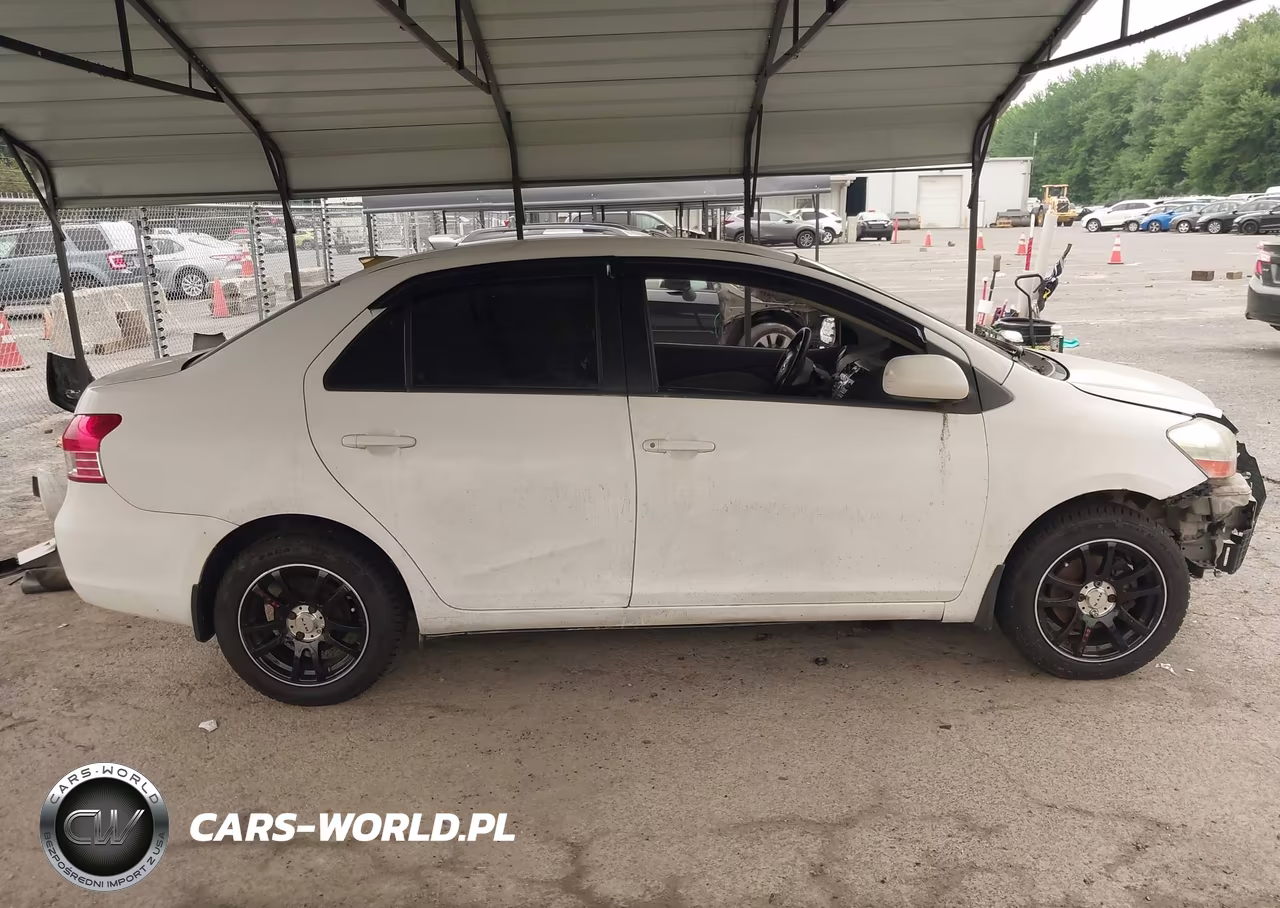 2009 Toyota Yaris VIN:JTDBT903X91336003 - 14