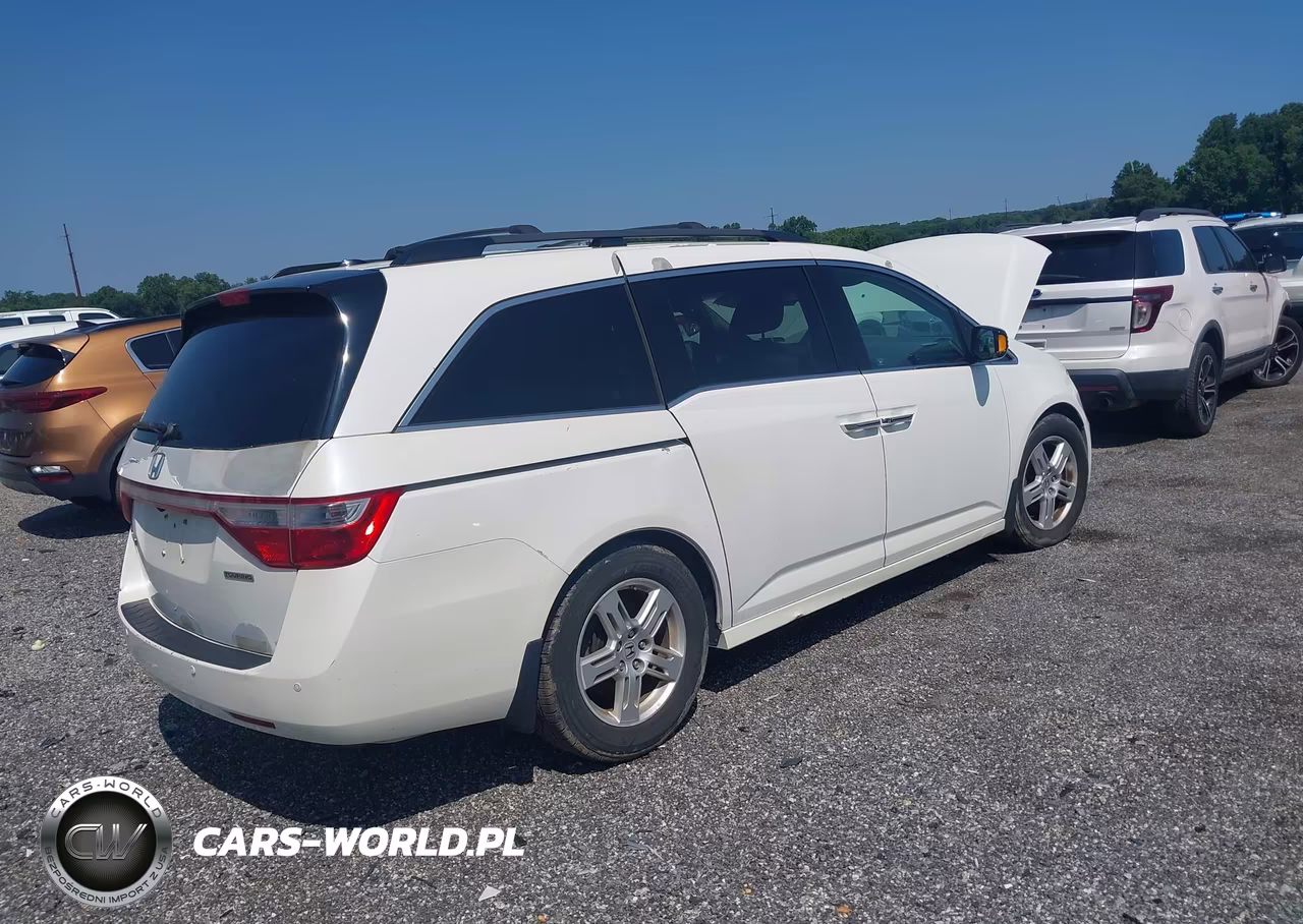 2012 Honda Odyssey Touring-Touring Elite VIN:5FNRL5H9XCB050070 - 4