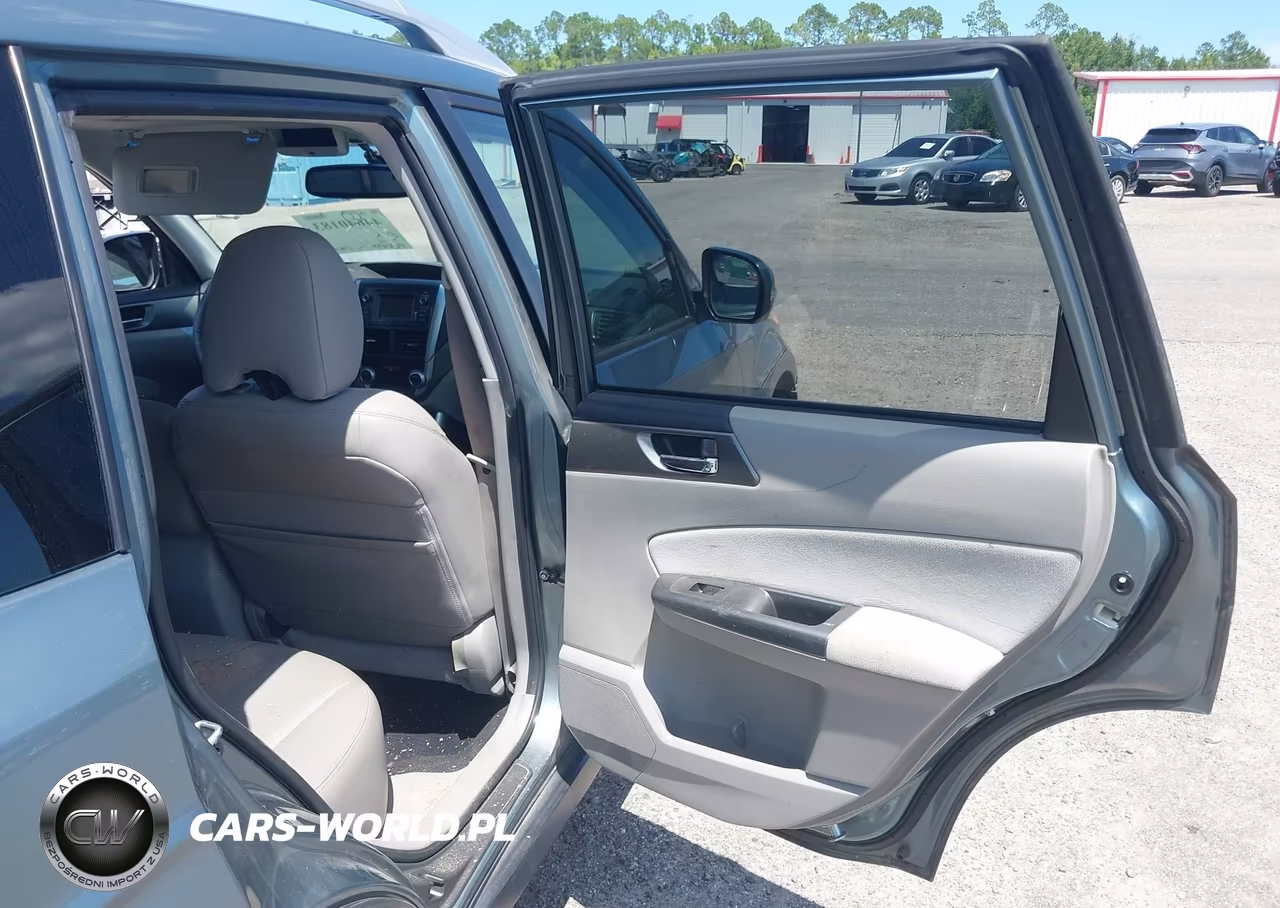 2011 Subaru Forester 2.5X Touring VIN:JF2SHAGC1BH725457 - 8