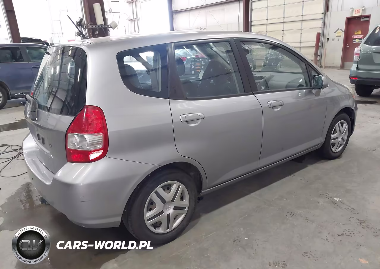 2007 Honda Fit VIN:JHMGD38437S060802 - 4