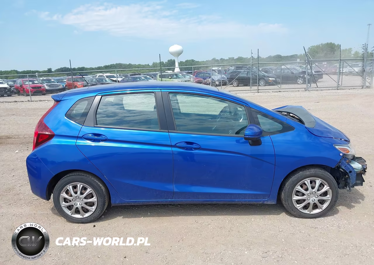 2015 Honda Fit Lx VIN:3HGGK5G53FM728667 - 14