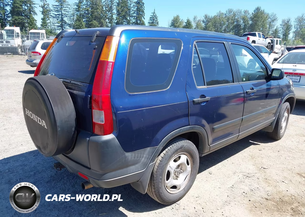 2002 Honda Cr-V Lx VIN:JHLRD78412C060711 - 4