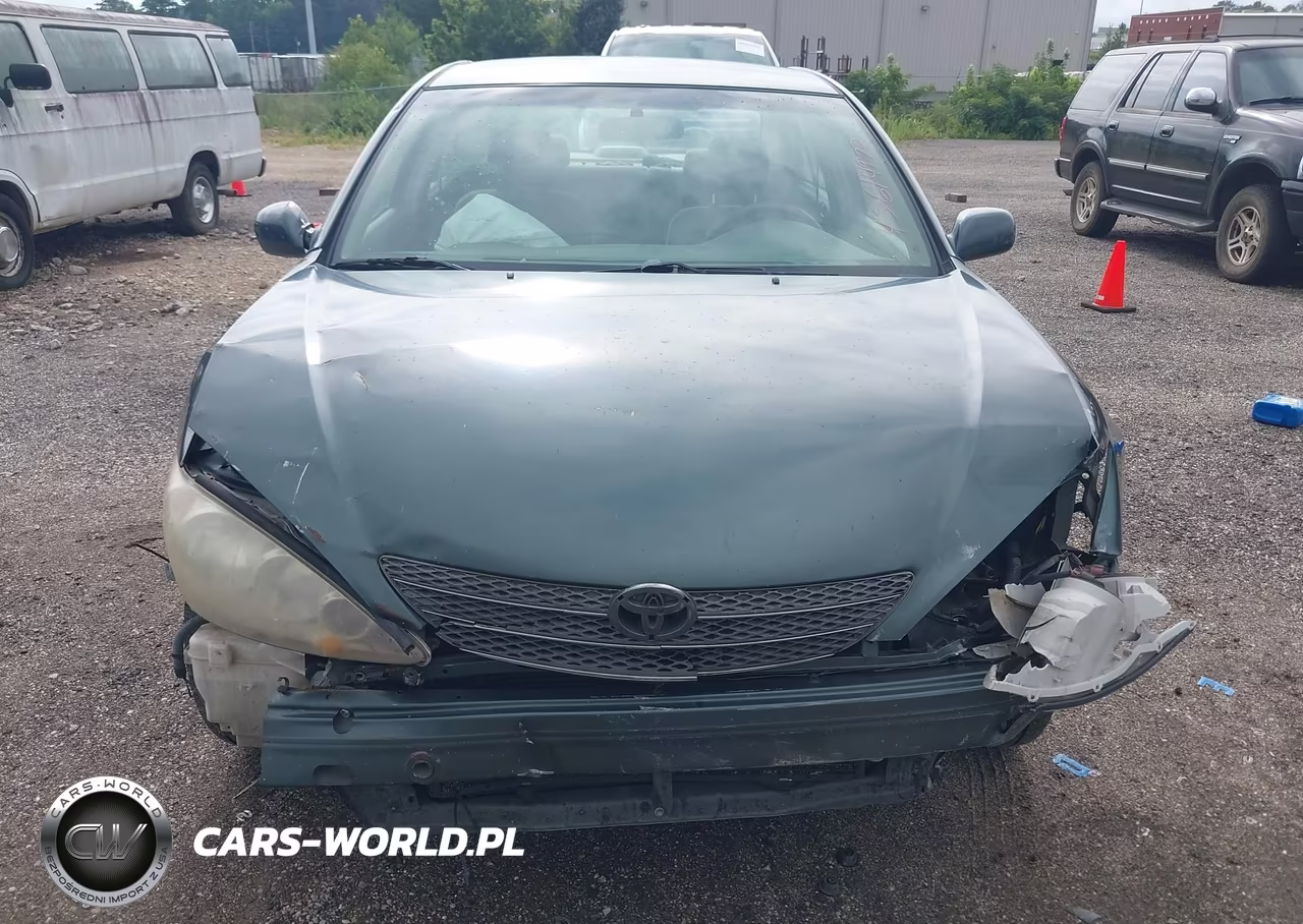 2002 Toyota Camry Le VIN:JTDBE32K020073012 - 6