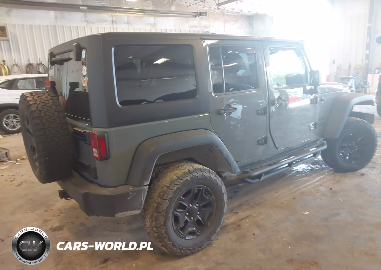 2015 Jeep Wrangler Unlimited Sport VIN:1C4BJWDG8FL689065 - 4