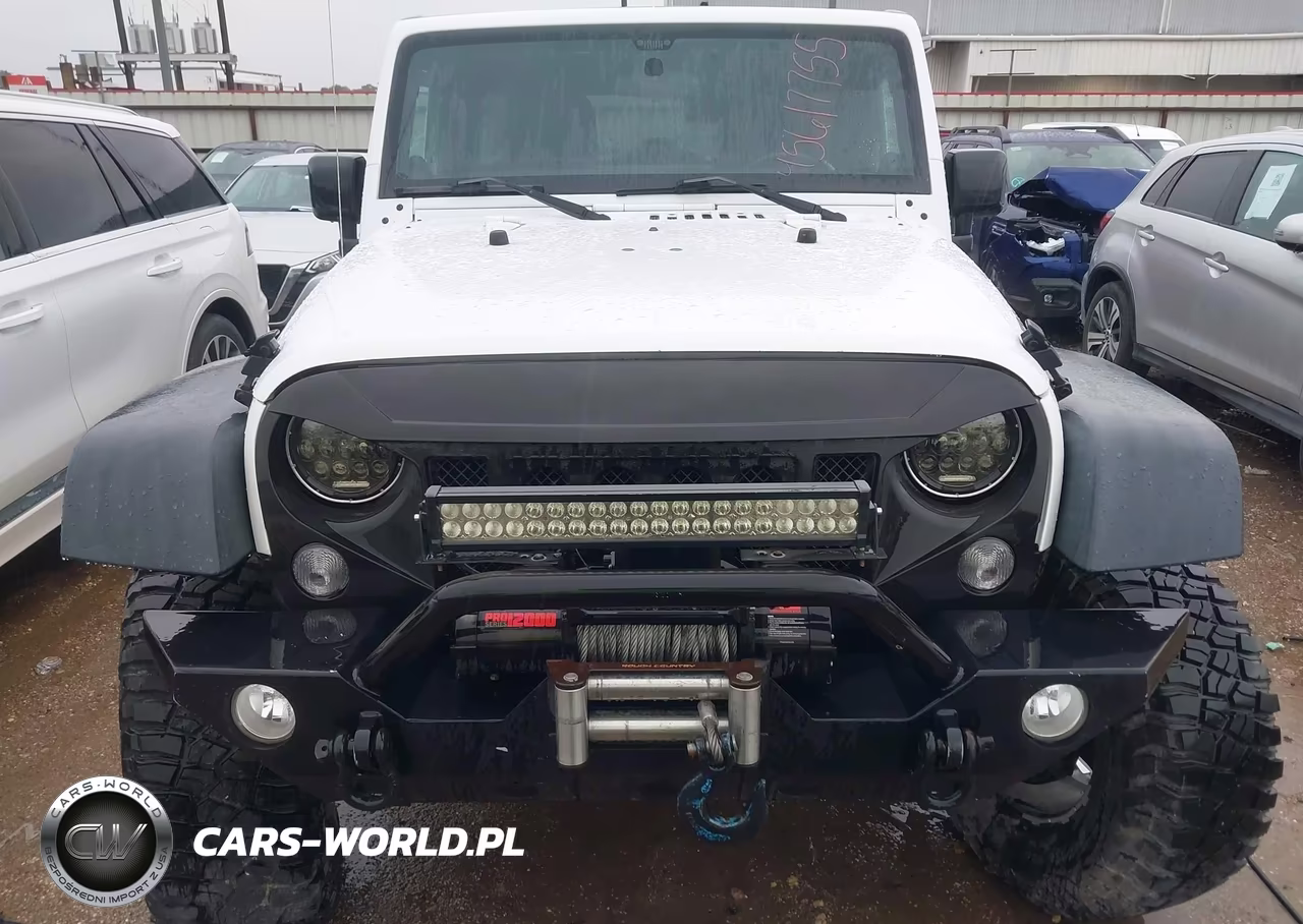 2011 Jeep Wrangler Unlimited Rubicon VIN:1J4BA6H10BL536027 - 12