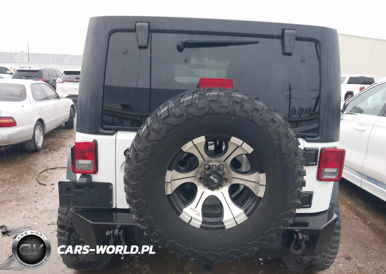 2011 Jeep Wrangler Unlimited Rubicon VIN:1J4BA6H10BL536027 - 16