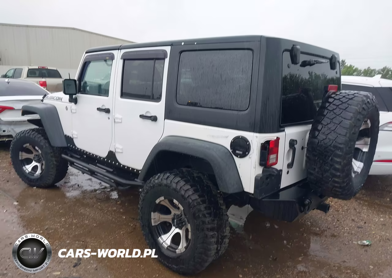 2011 Jeep Wrangler Unlimited Rubicon VIN:1J4BA6H10BL536027 - 3