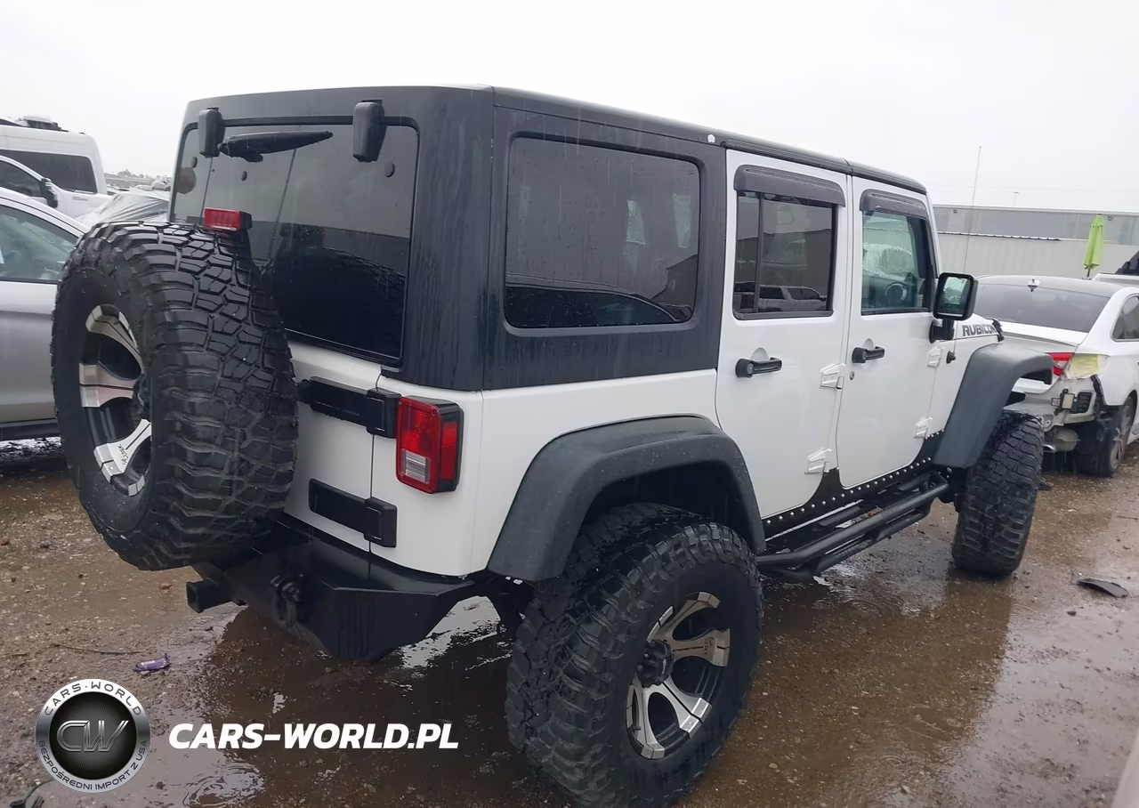 2011 Jeep Wrangler Unlimited Rubicon VIN:1J4BA6H10BL536027 - 4