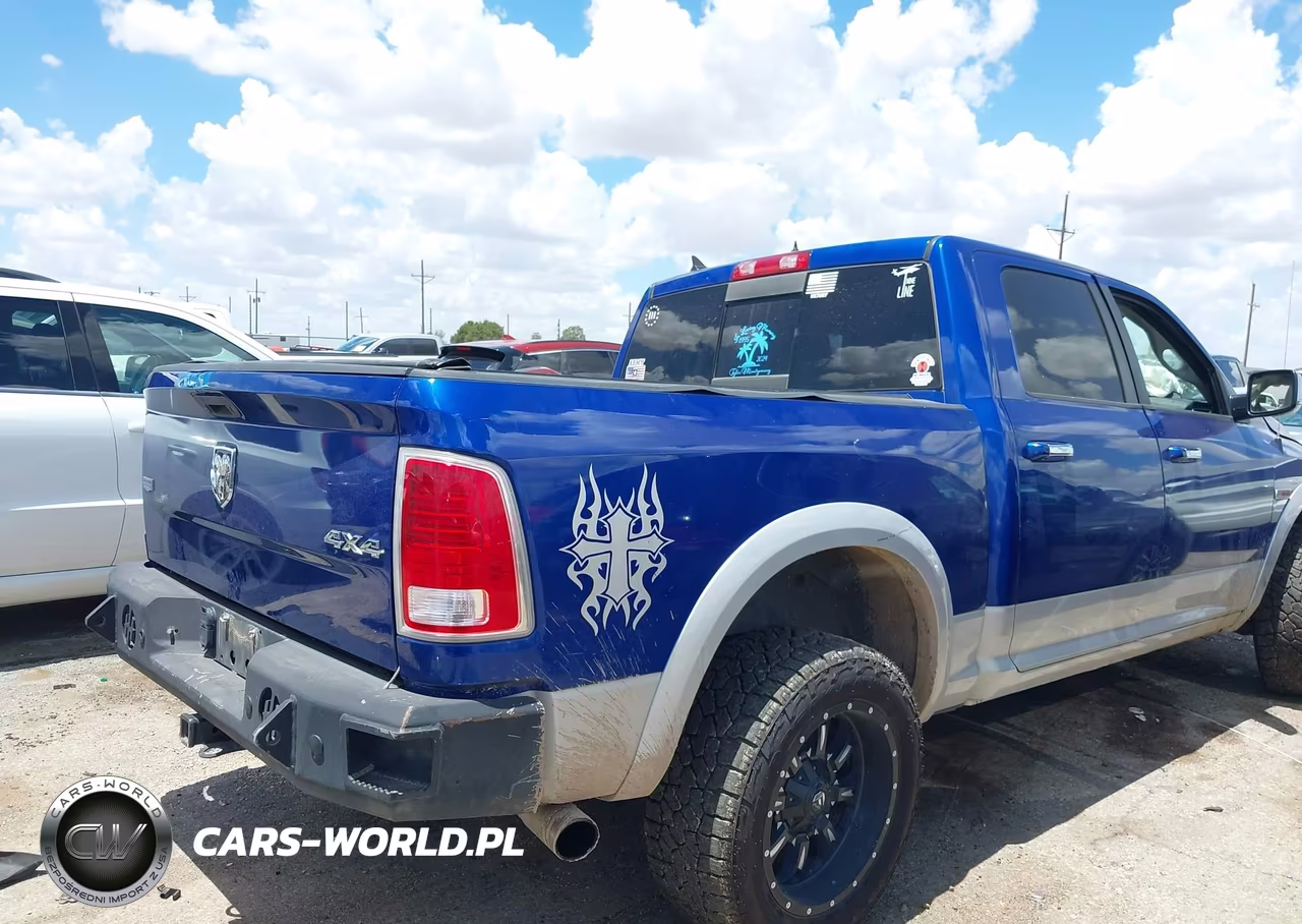 2015 Ram 1500 Laramie VIN:1C6RR7NM0FS531673 - 4