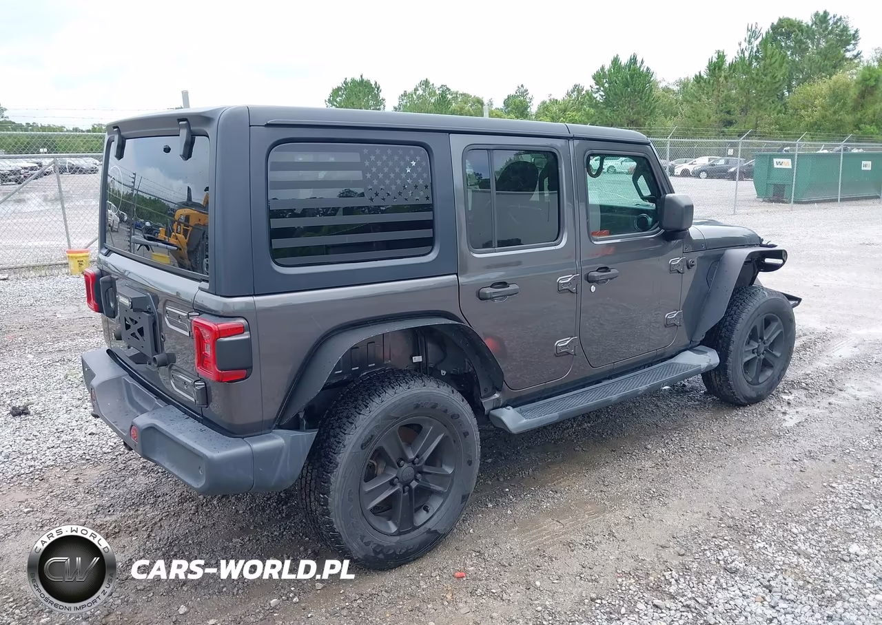 2019 Jeep Wrangler Unlimited Sahara 4X4 VIN:1C4HJXEN9KW600173 - 4