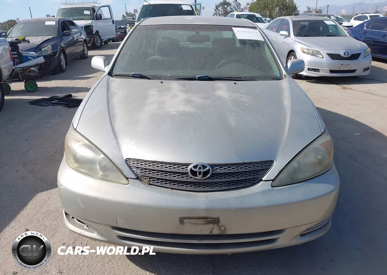 2002 Toyota Camry Le VIN:JTDBE32KX20046304 - 6