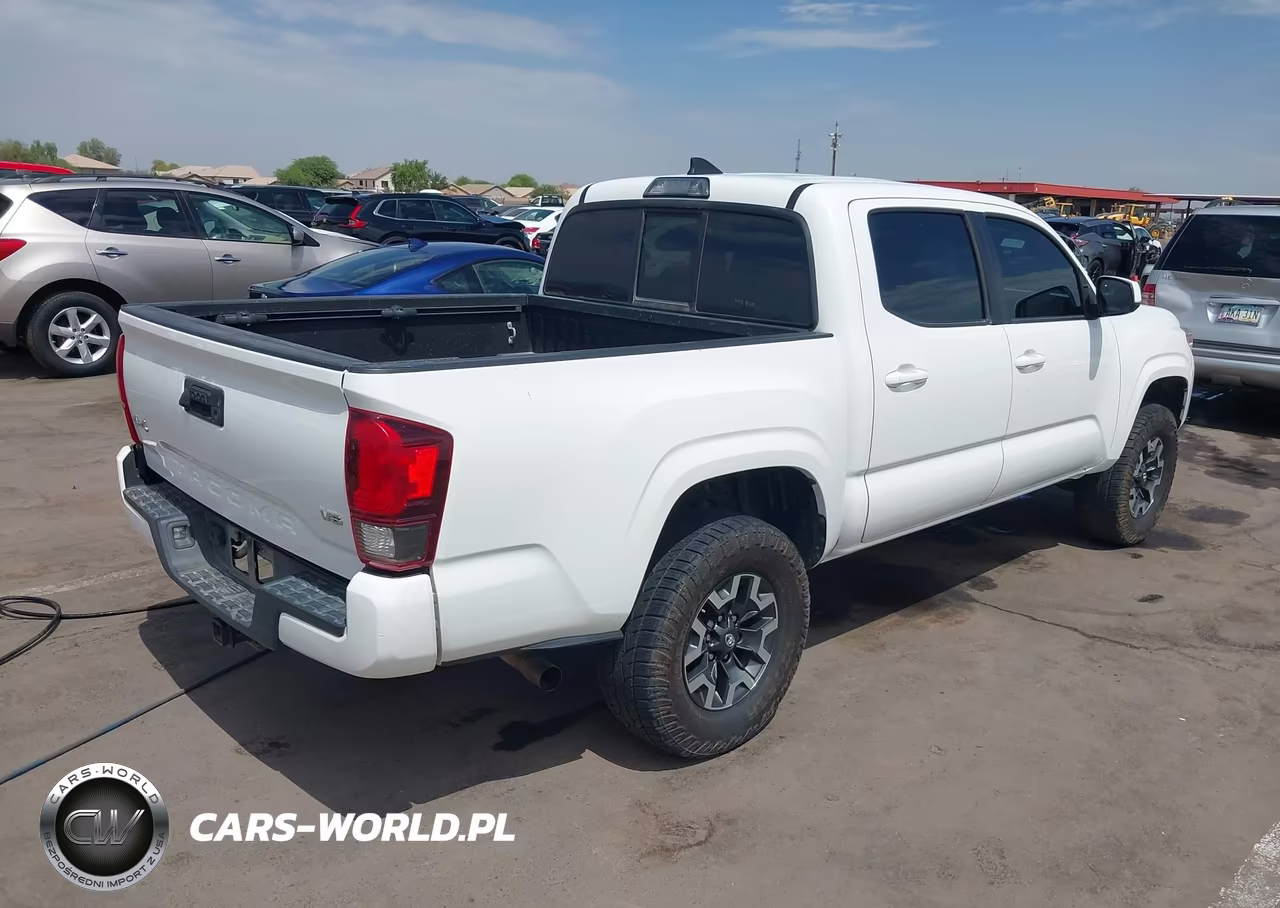 2018 Toyota Tacoma Sr V6 VIN:3TMCZ5AN9JM148897 - 4