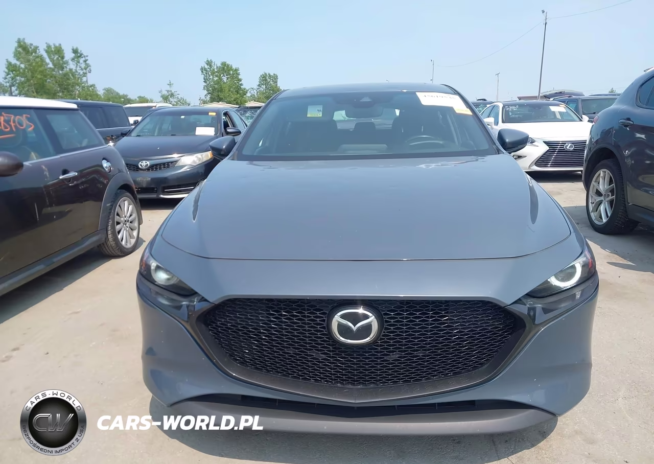 2021 Mazda Mazda3 Premium VIN:JM1BPBML0M1402962 - 12