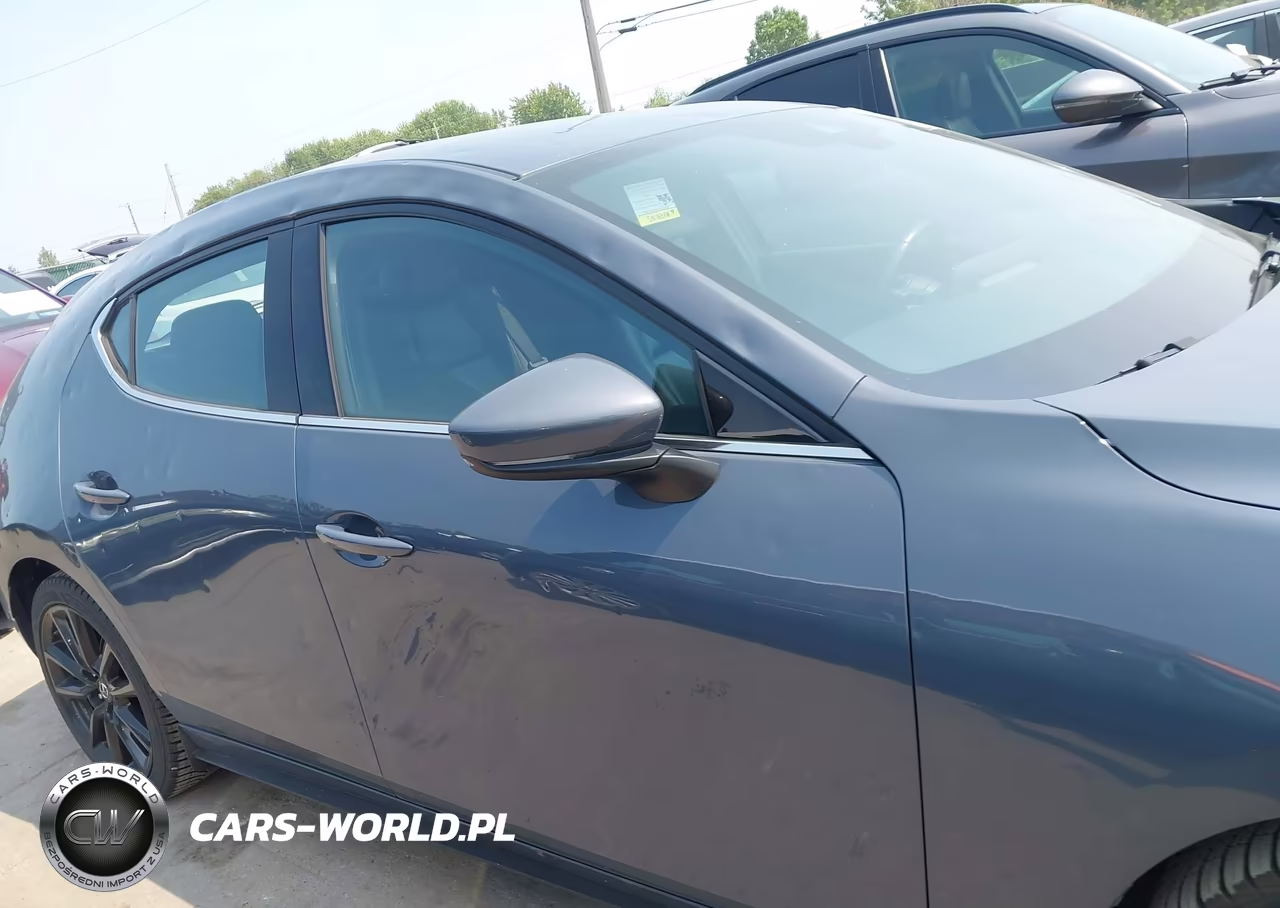 2021 Mazda Mazda3 Premium VIN:JM1BPBML0M1402962 - 13