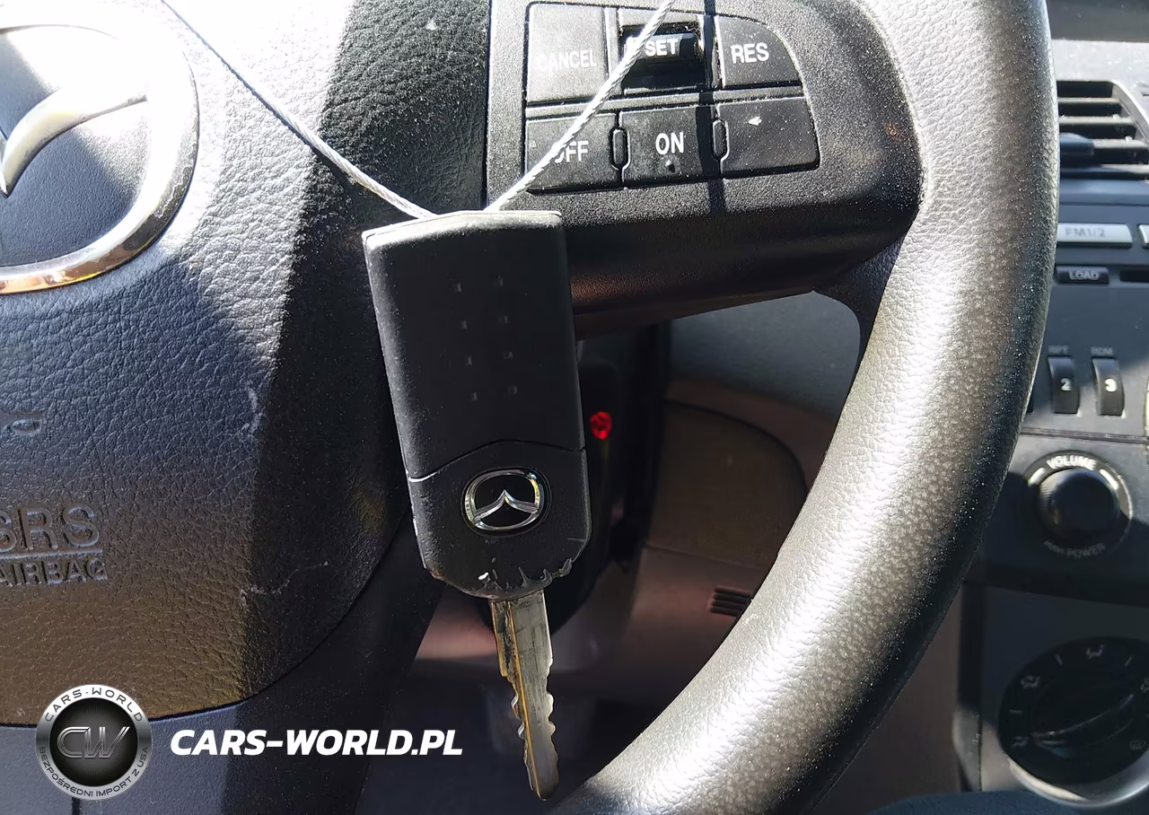 2011 Mazda Mazda3 I Touring VIN:JM1BL1VG8B1461309 - 11